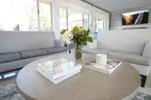 A table with books and flowers at Marin Post Acute